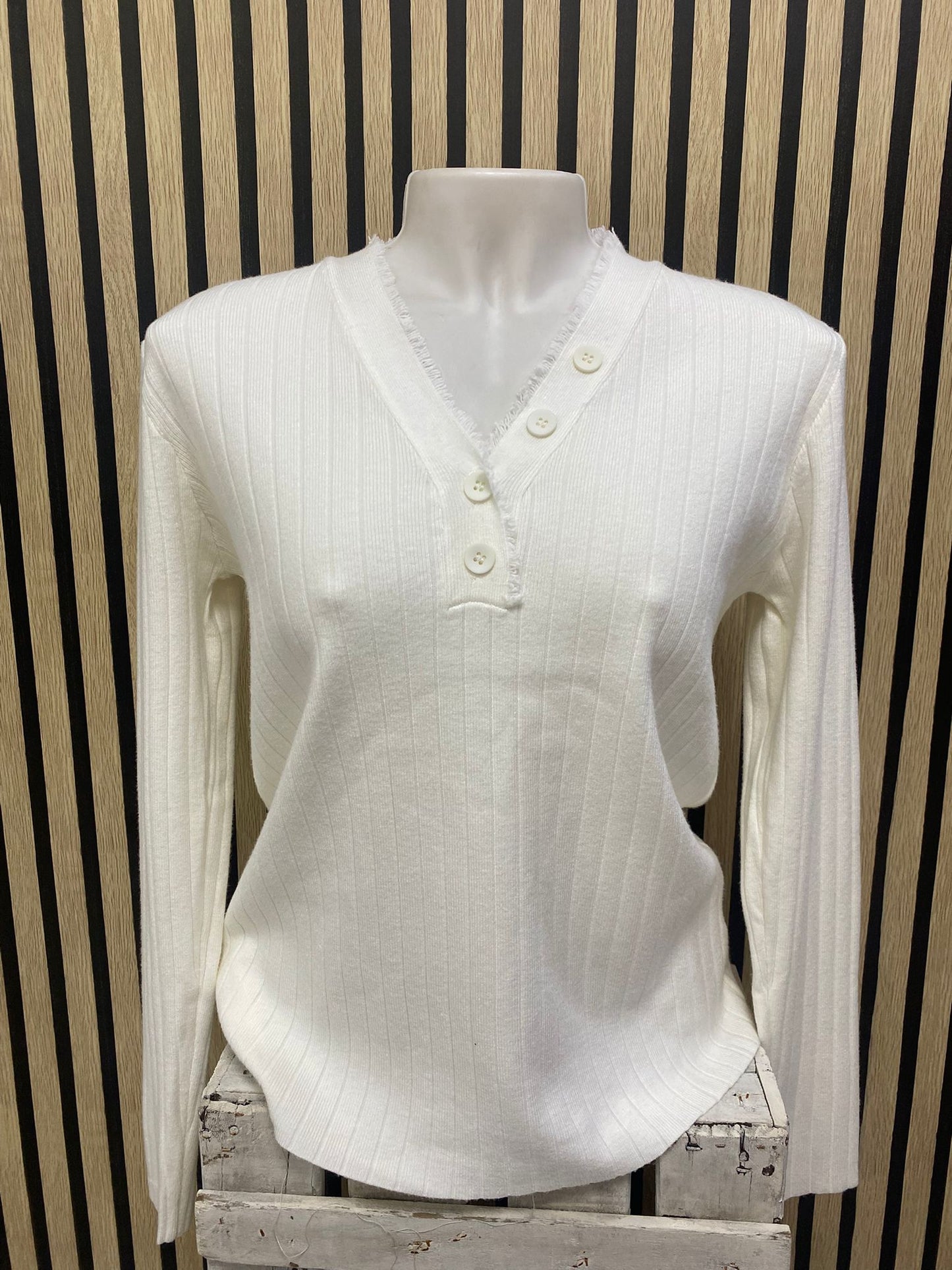 Suéter blanco Flecos