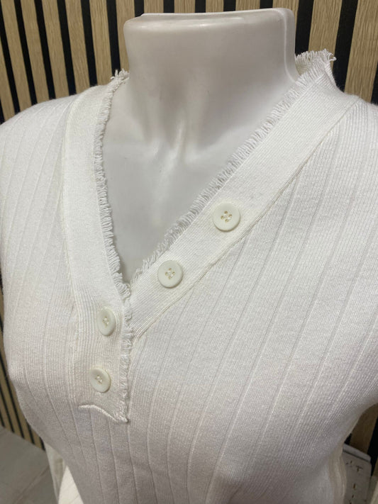 Suéter blanco Flecos